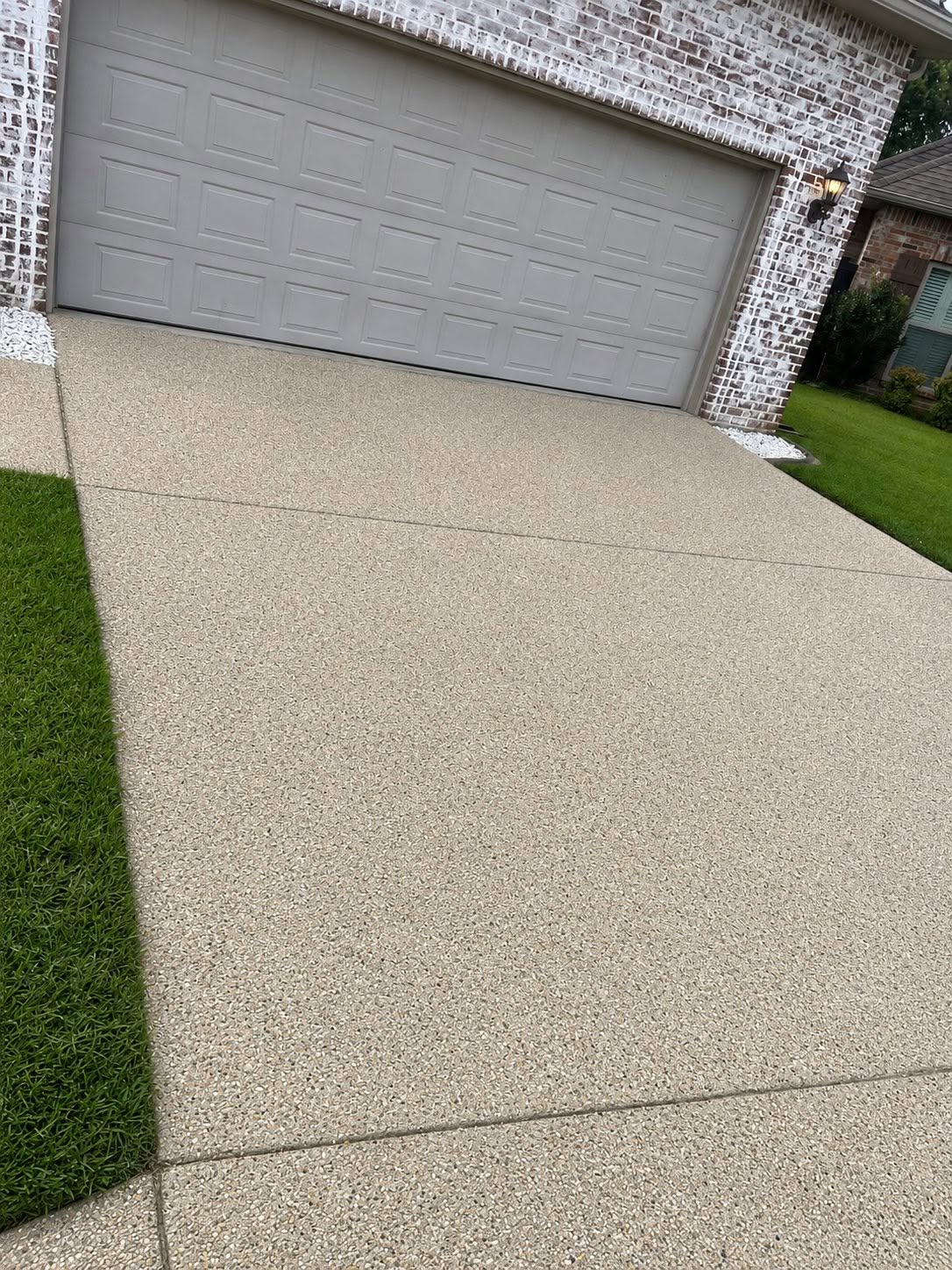 Clean driveway after pressure washing